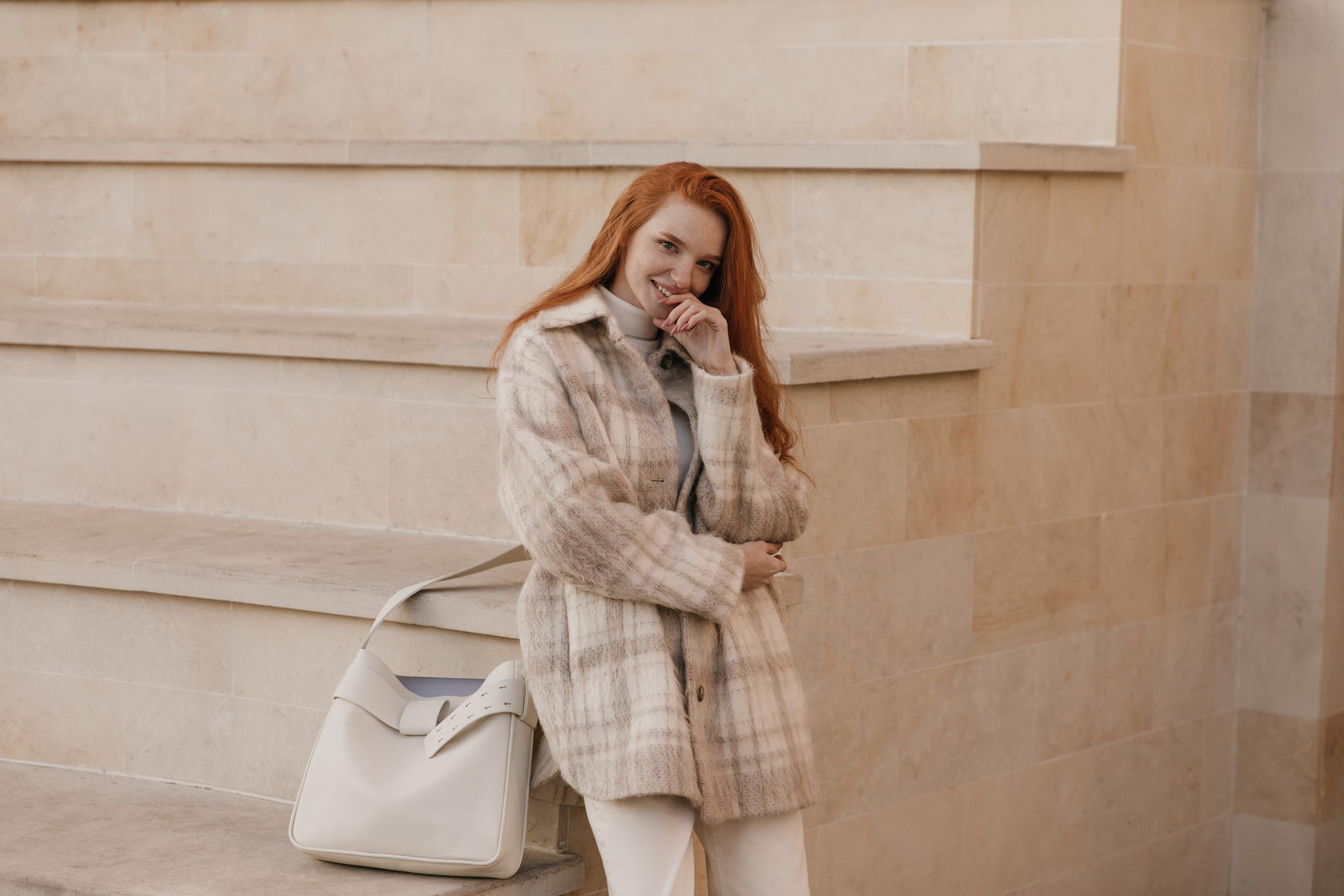 Woman in a plaid coat