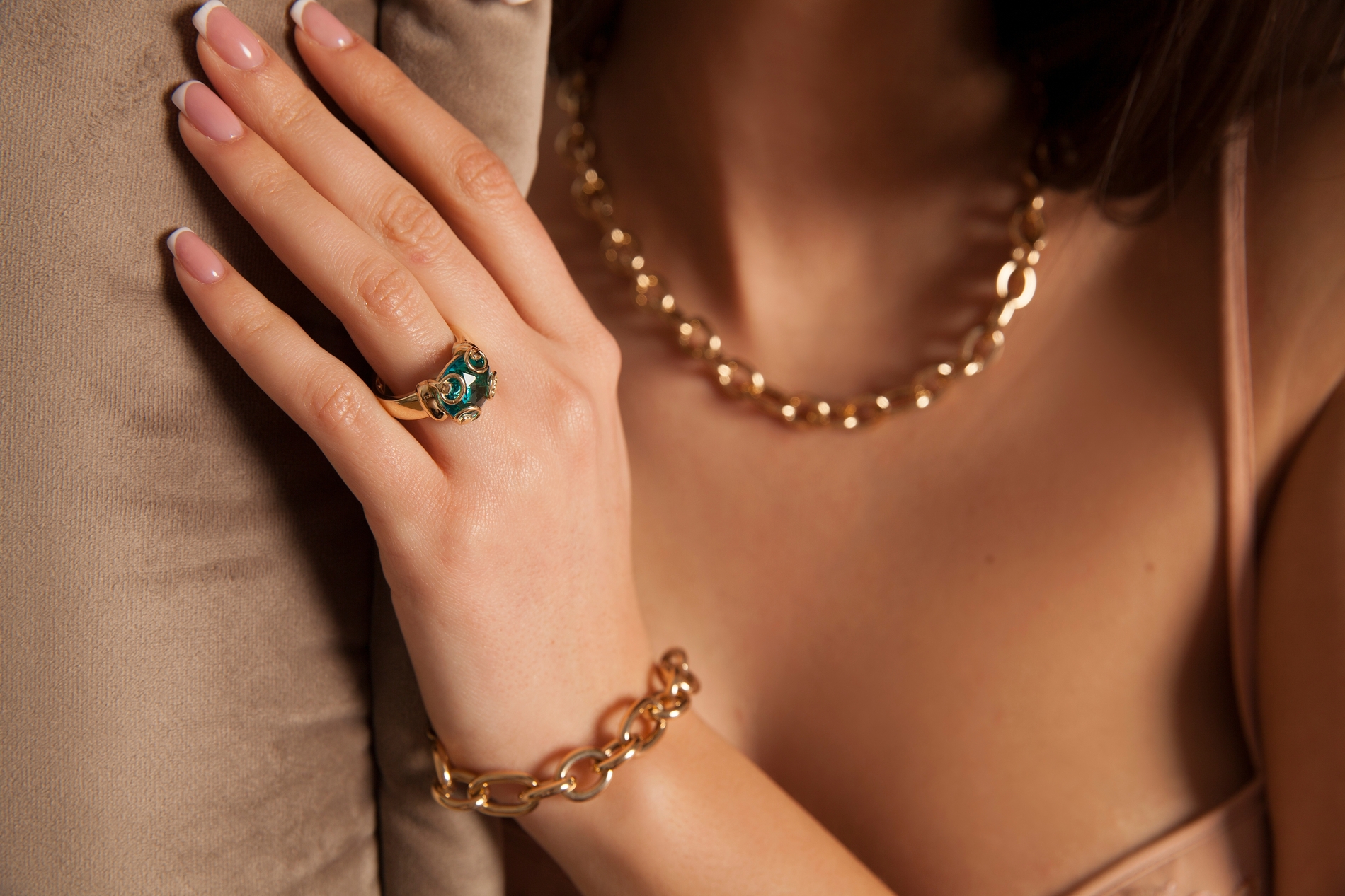 woman wearing gold jewelry